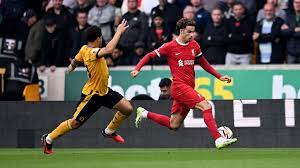 Two late goals earned Liverpool a 3-1 win at Wolverhampton Wanderers