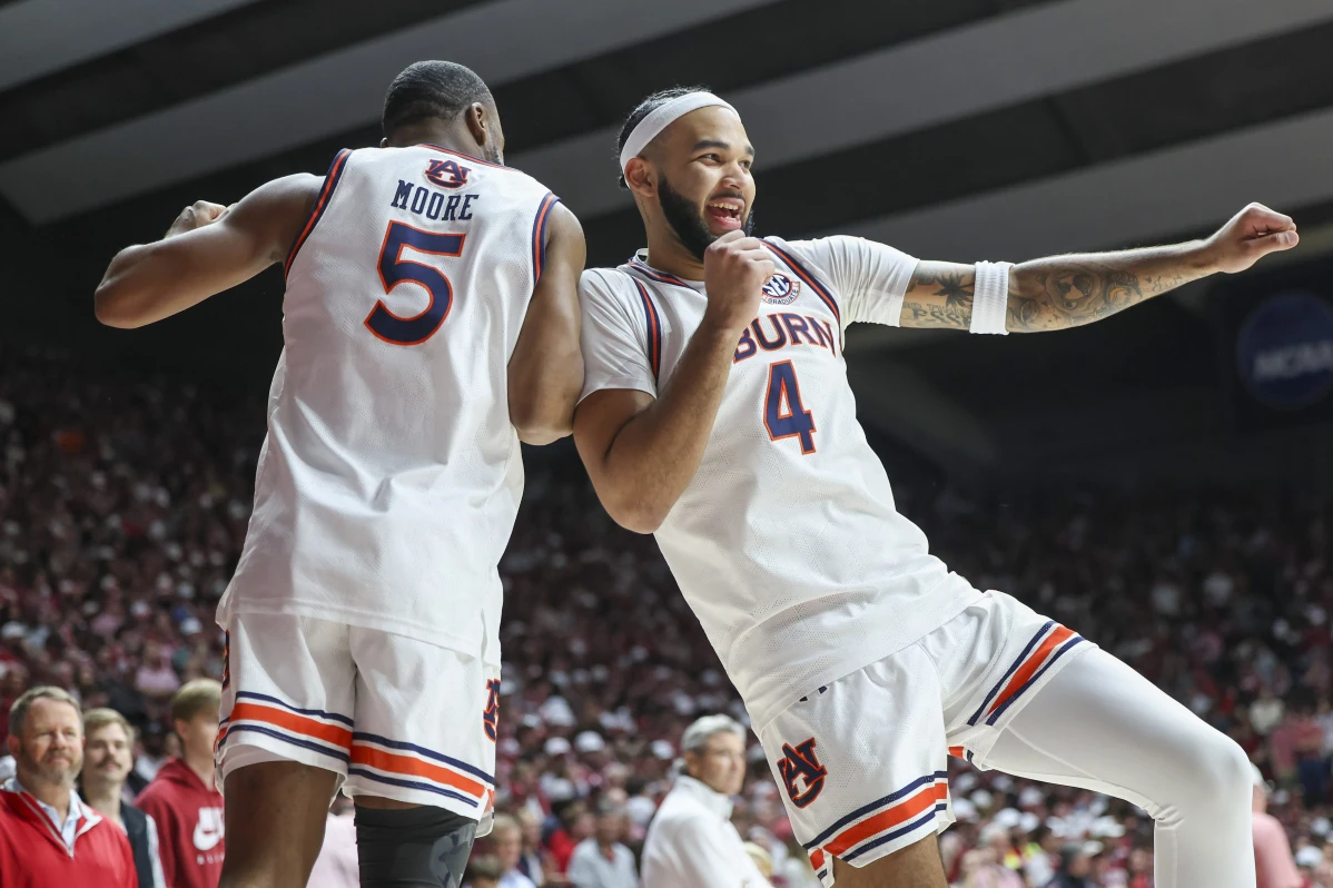 No. 1 Auburn defeats No. 2 Alabama and their in-state rival 94-85 behind 19 points from Johni Broome.